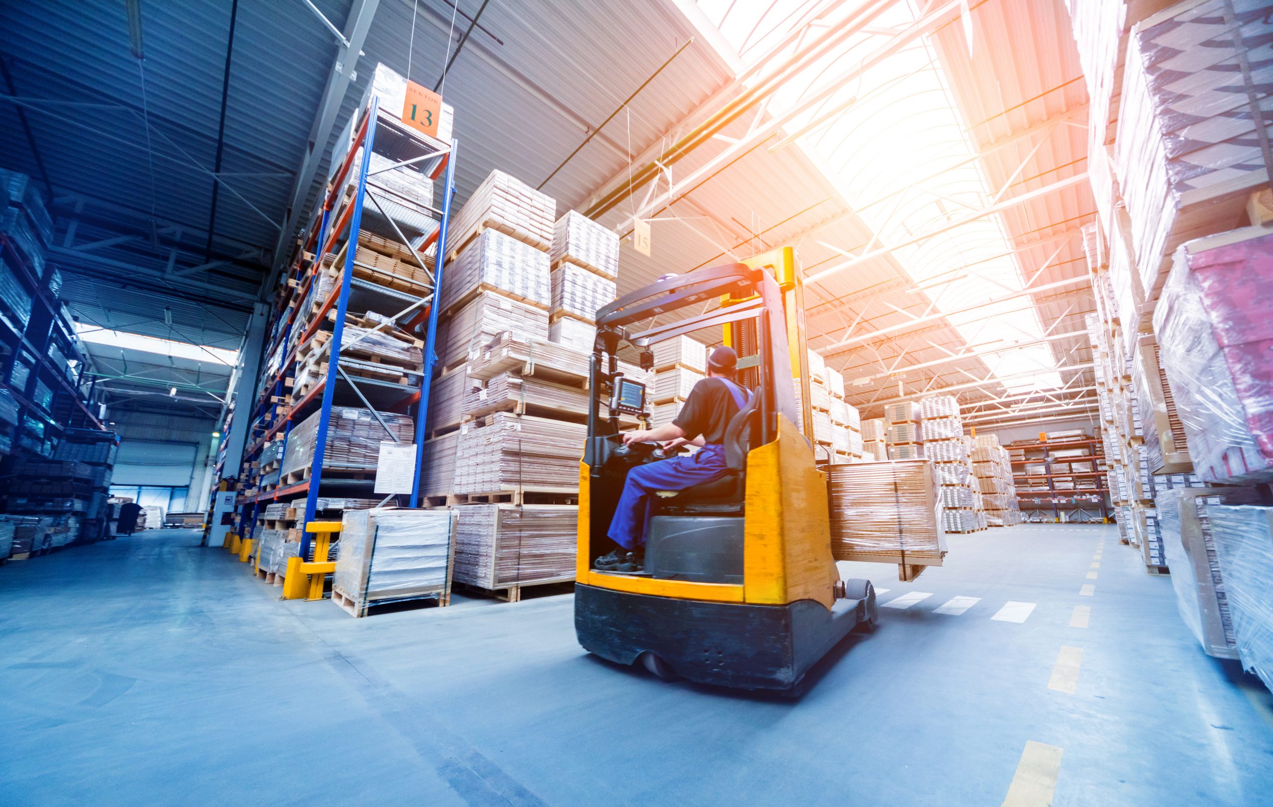 Forklift loader in storage warehouse ship yard. Distribution products. Delivery. Logistics. Transportation. Business background
