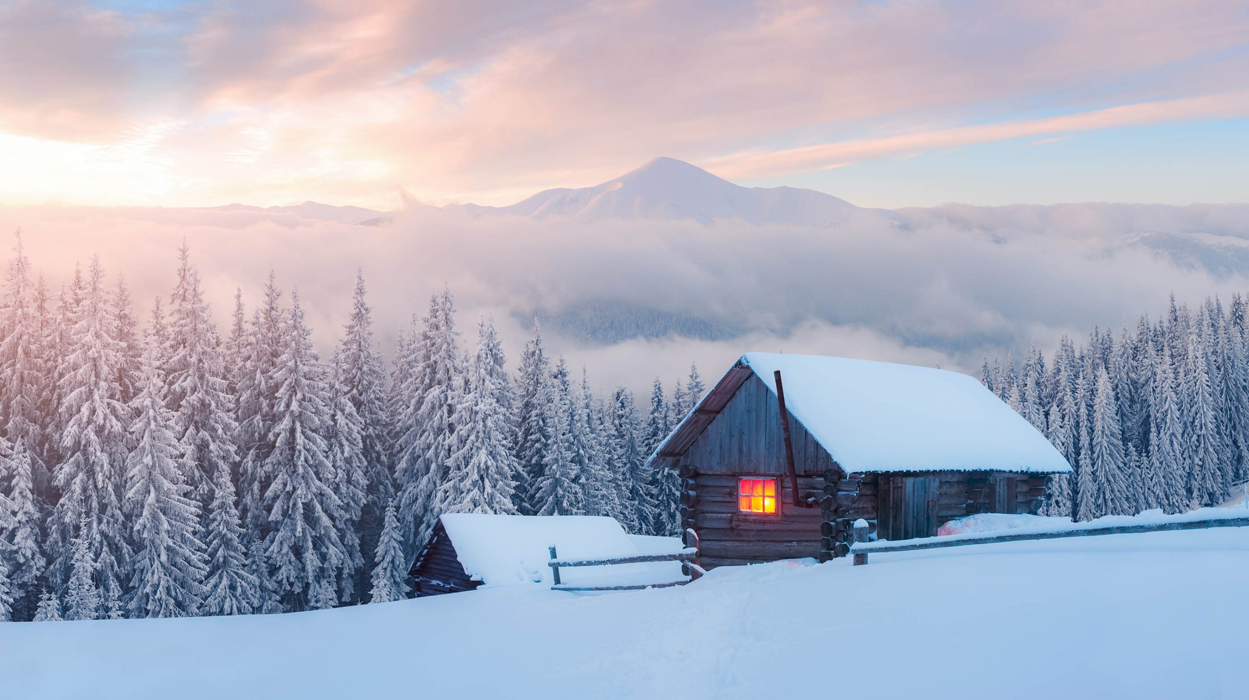 A cabin in a snowy landscape