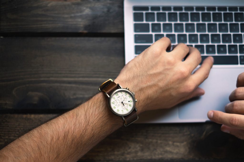 Man looking at his watch